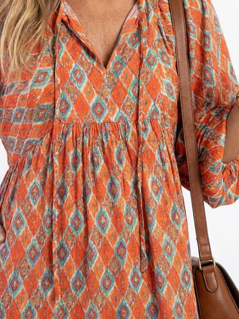 Amara | Geometric Print V-Neck Tiered Midi Dress