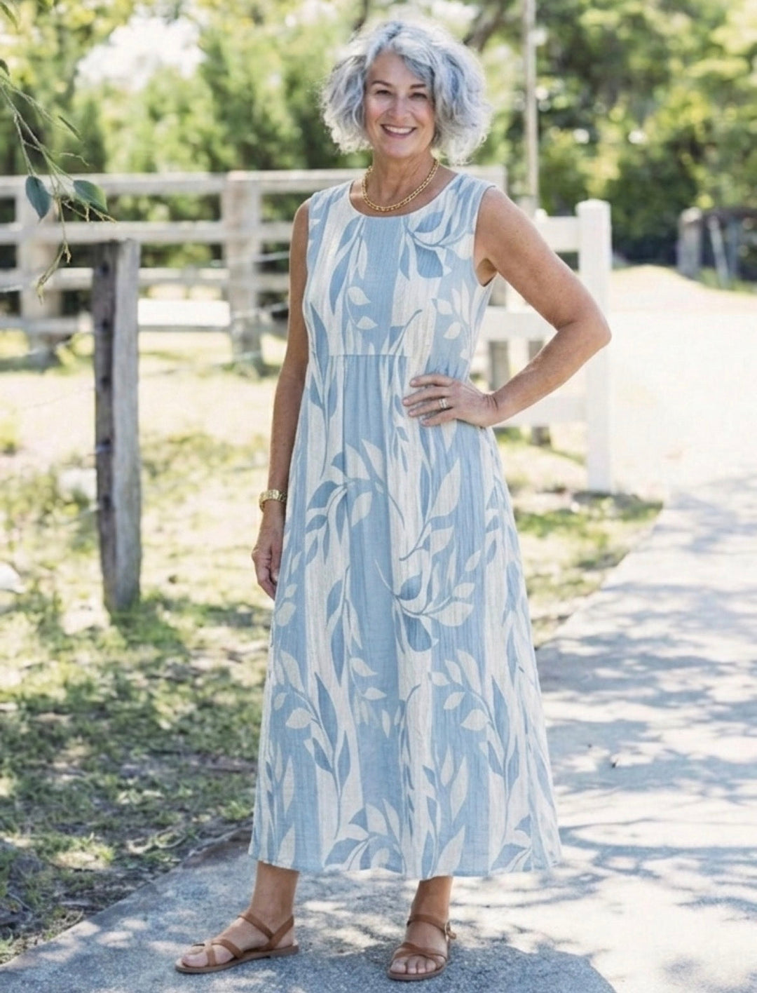 Solene | Sleeveless Blue Leaf Pattern Midi Dress